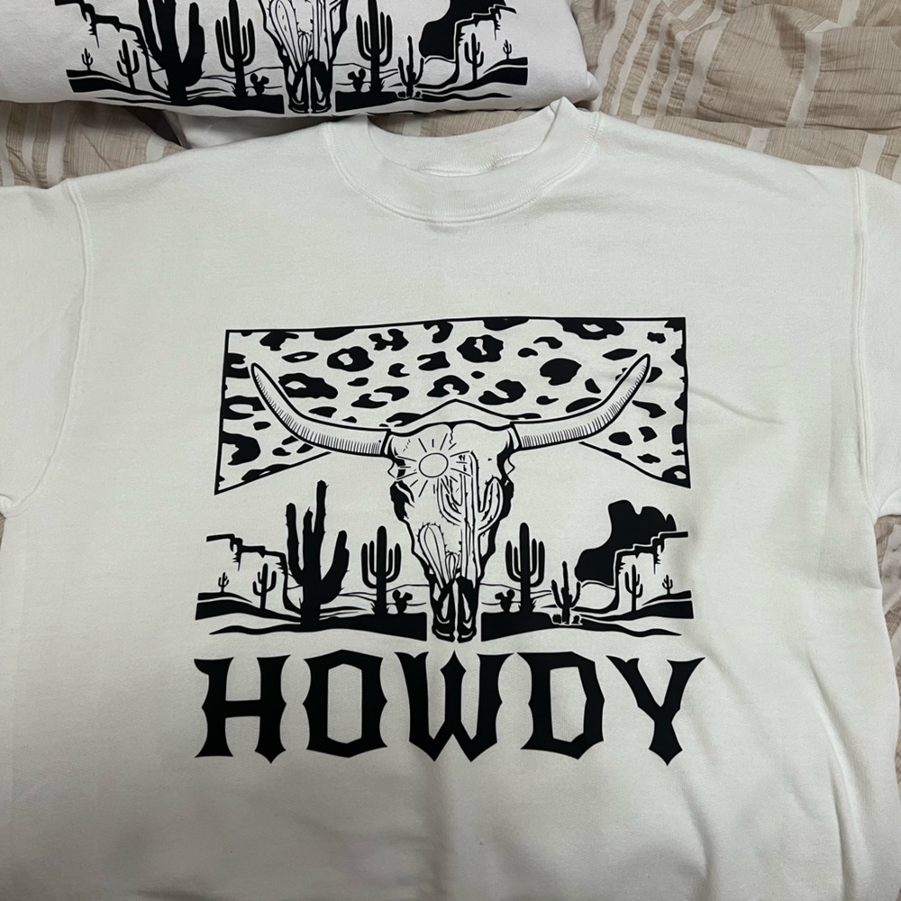 I’m selling these white western crewnecks super cute brand new never worn
